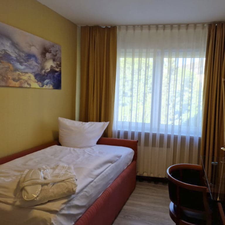 Foto des Zimmer 4 im 1 Obergeschoss - Pension Palé Bach in Bad Hersfeld